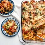 pasta on blue plates with pasta dish to the right