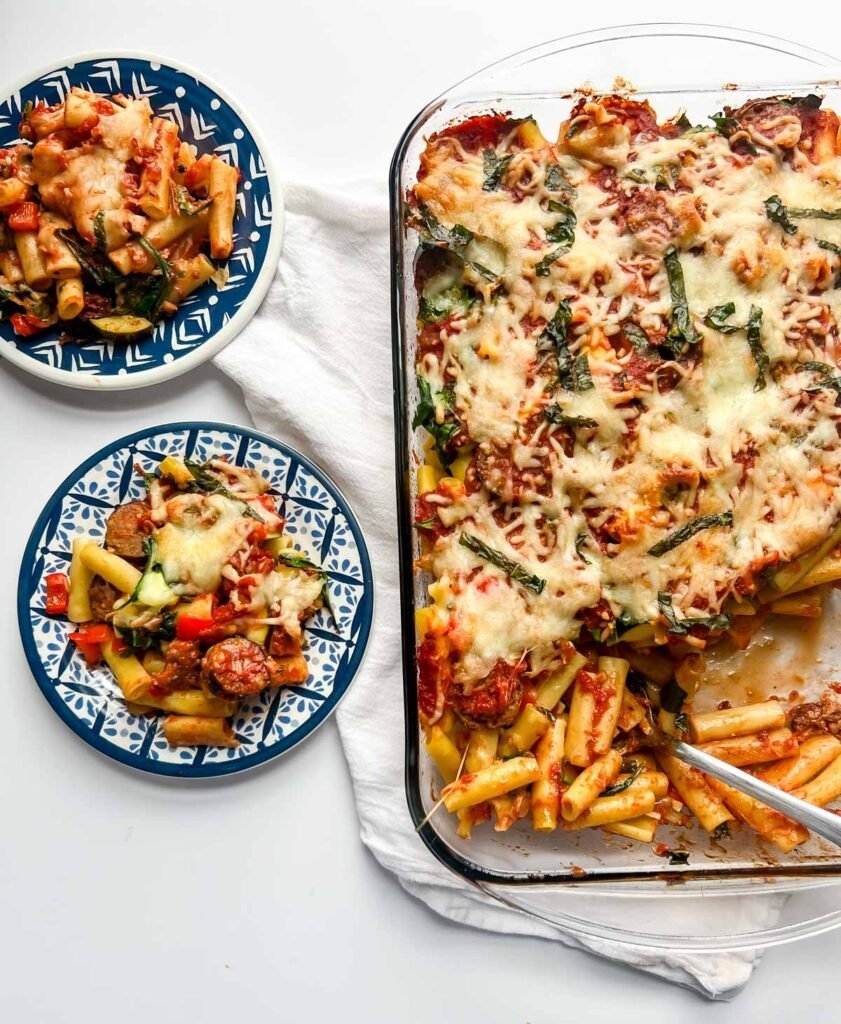 pasta on blue plates with pasta dish to the right