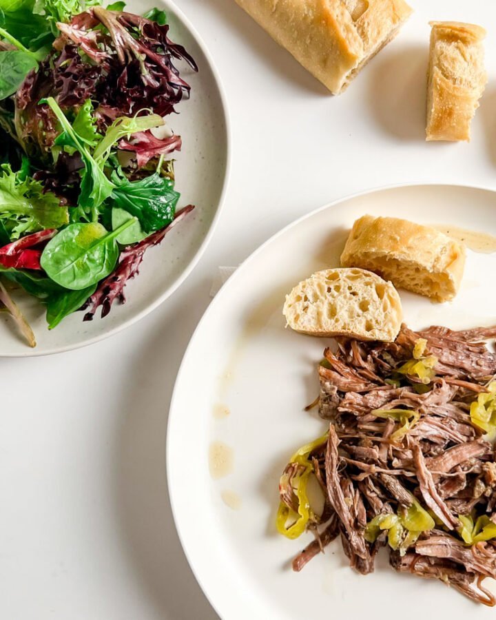 mama's italian beef with baguette slices and green salad
