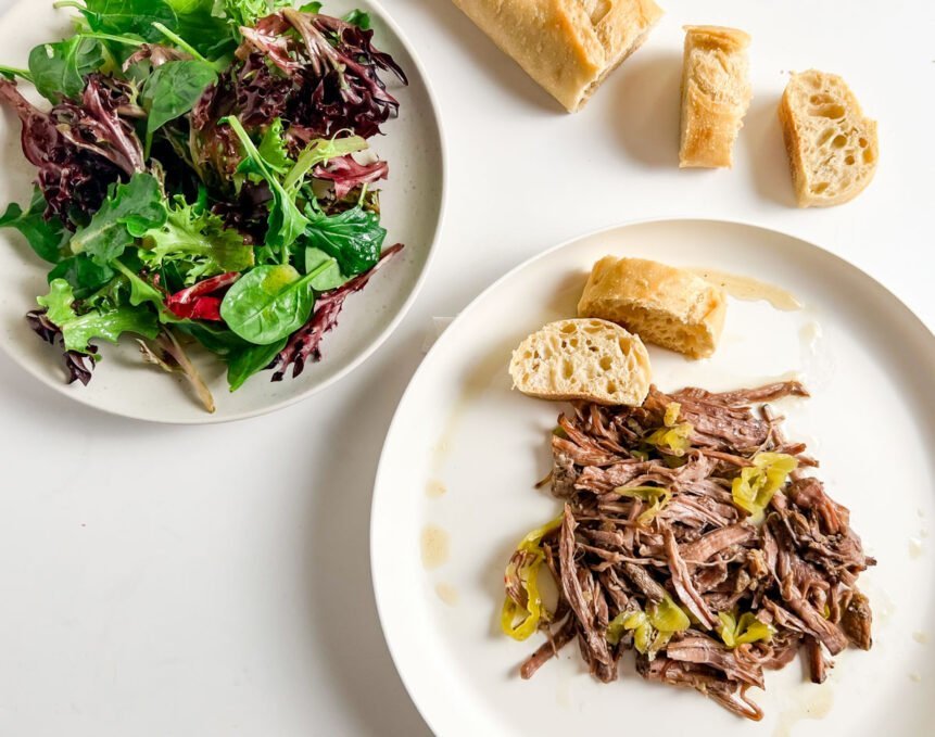 mama's italian beef with baguette slices and green salad